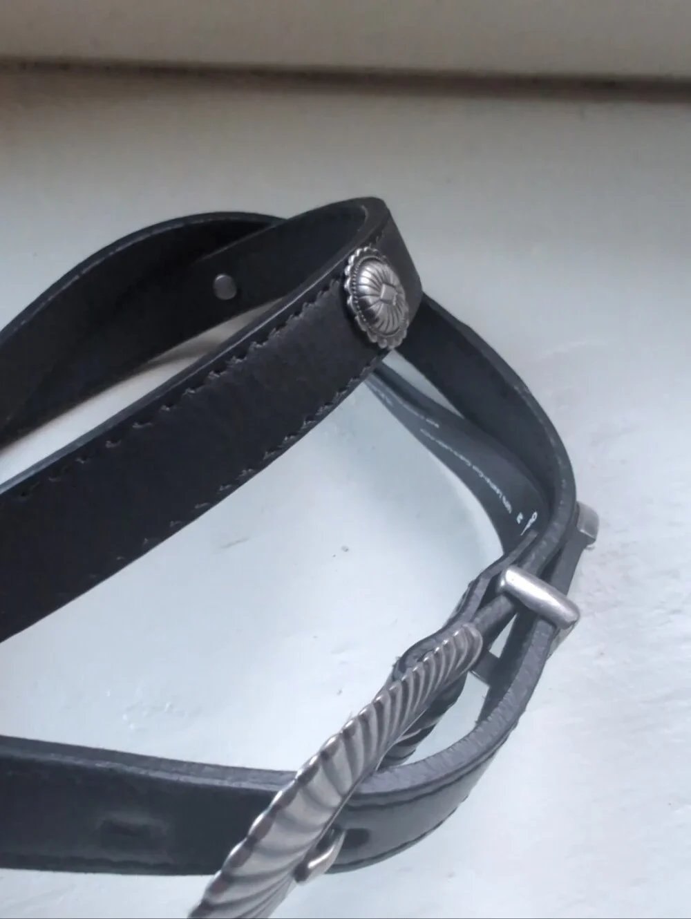 Black real leather concho skinny Western belt with silver tone sunburst buckle
